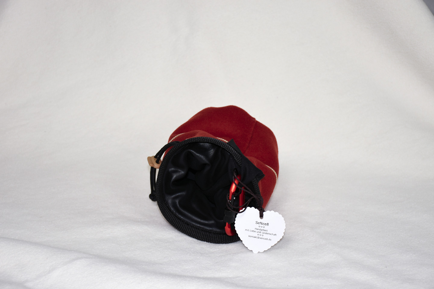 Artikel: CB3305 / Motiv: Feuergott / Farbe: braun, schwarz / Material: 100% Schurwolle, Softshell, Mixstoffe